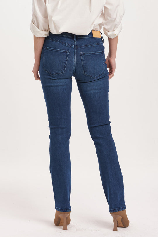 image of a female model wearing a BLAIRE MID RISE SLIM STRAIGHT JEANS VIOLET BLUE DEAR JOHN DENIM 