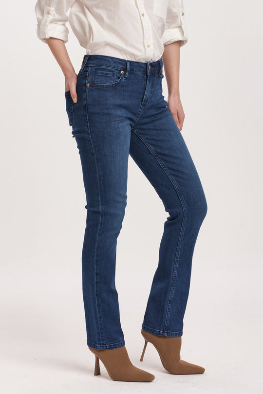 image of a female model wearing a BLAIRE MID RISE SLIM STRAIGHT JEANS VIOLET BLUE DEAR JOHN DENIM 