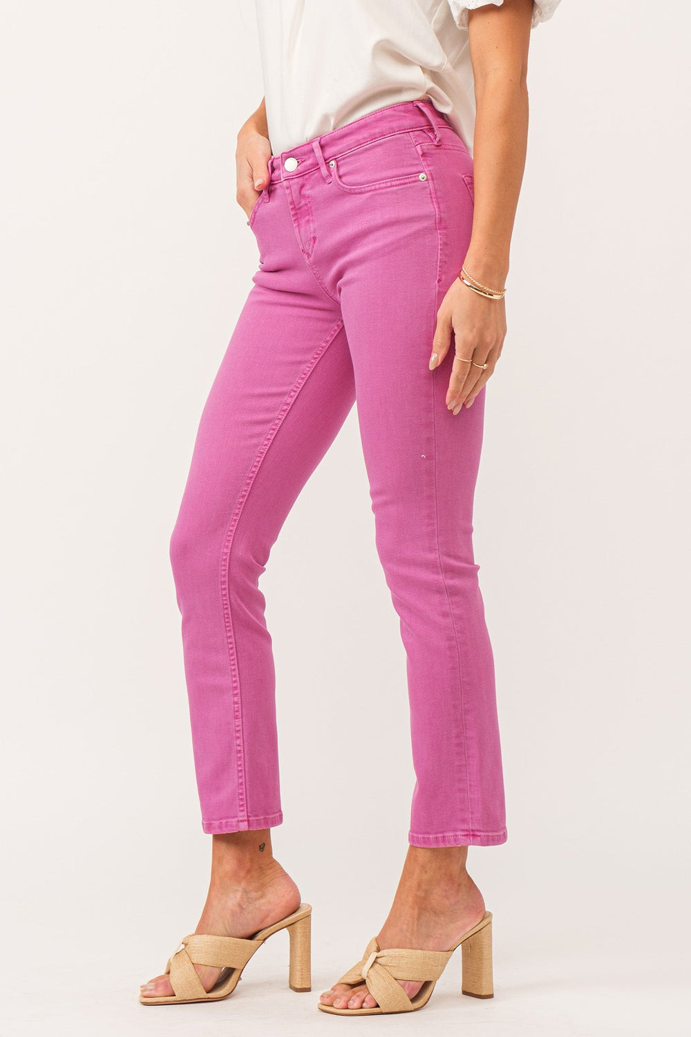 image of a female model wearing a BLAIRE MID RISE SLIM STRAIGHT JEANS CARNATION PINK DEAR JOHN DENIM 