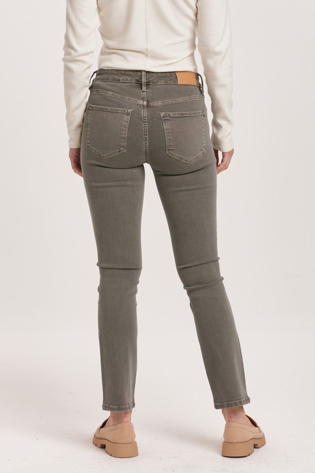 image of a female model wearing a BLAIRE MID RISE SLIM STRAIGHT JEANS GRAPHITE DEAR JOHN DENIM 