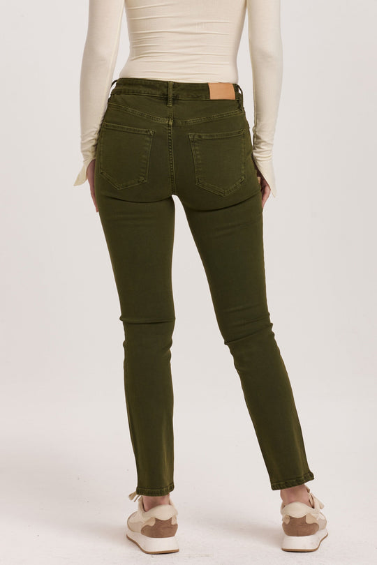 image of a female model wearing a BLAIRE MID RISE SLIM STRAIGHT JEANS PINE DEAR JOHN DENIM 