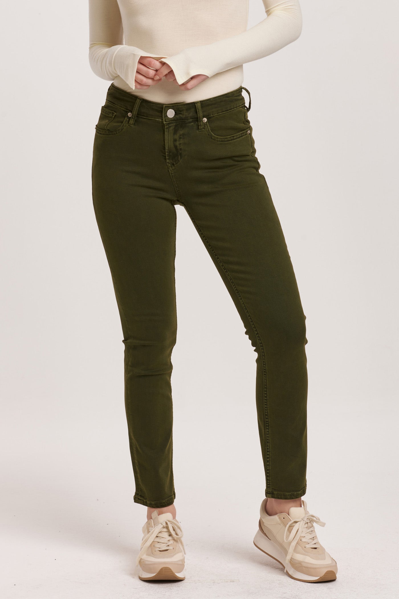 image of a female model wearing a BLAIRE MID RISE SLIM STRAIGHT JEANS PINE DEAR JOHN DENIM 