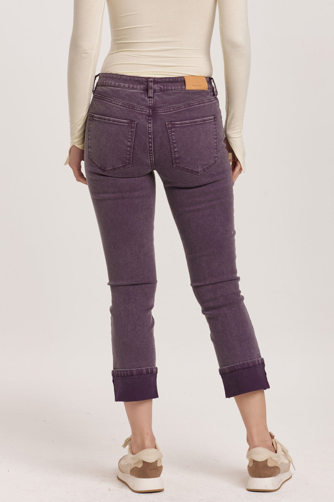 image of a female model wearing a BLAIRE HIGH RISE CUFFED SLIM STRAIGHT JEANS PURPLE PLUM DEAR JOHN DENIM 