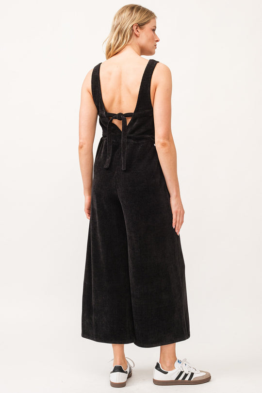 image of a female model wearing a SIVAN TANK JUMPSUIT BLACK CHENILLE DEAR JOHN DENIM 