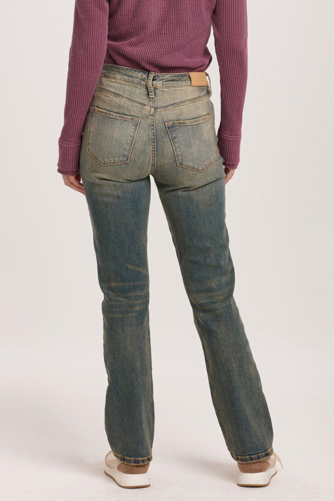 image of a female model wearing a PARIS BOOTCUT FIT SUPER HIGH RISE JEAN WRATH DEAR JOHN DENIM 