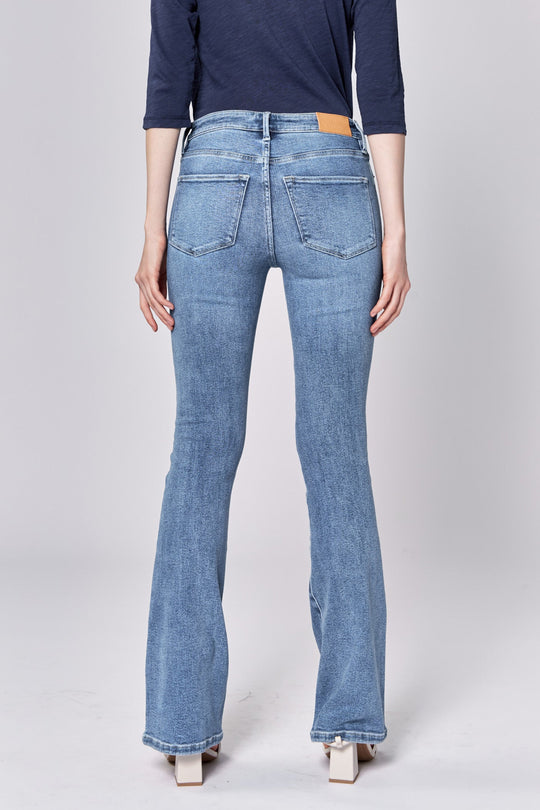 image of a female model wearing a JAXTYN MID RISE FULL INSEAM BOOTCUT JEANS LOVELLE DEAR JOHN DENIM 