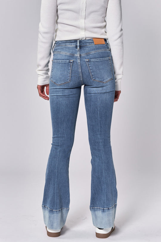 image of a female model wearing a JAXTYN MID RISE FULL INSEAM BOOTCUT JEANS LAGOON DEAR JOHN DENIM 