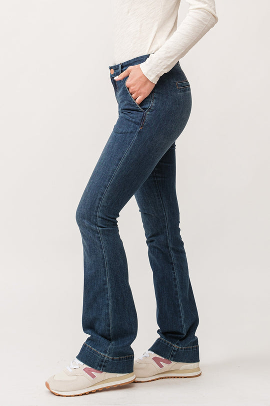 image of a female model wearing a JAXTYN MID RISE CLEAN WIDE HEM BOOTCUT JEANS DAZZLER DEAR JOHN DENIM 