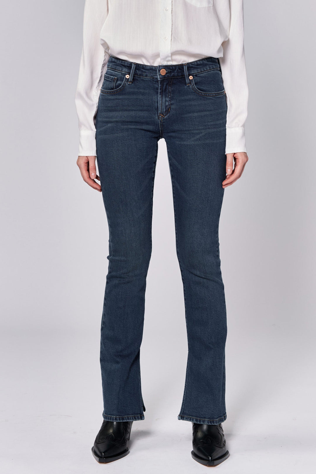 image of a female model wearing a JAXTYN MID RISE FULL INSEAM BOOTCUT JEANS GARNISH DEAR JOHN DENIM 