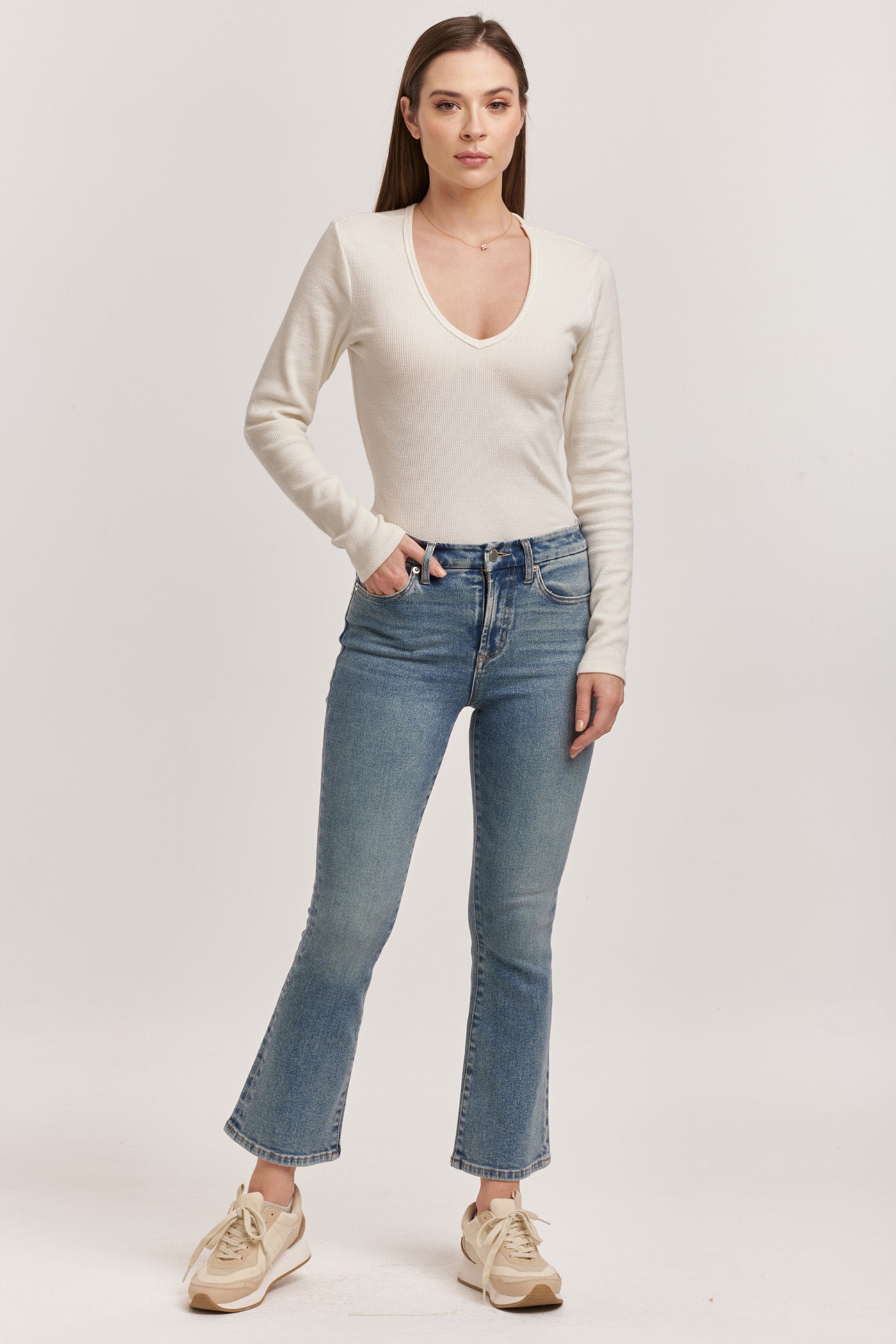 image of a female model wearing a JEANNE HIGH RISE CROPPED FLARE JEANS ANTIQUE WASH DEAR JOHN DENIM 