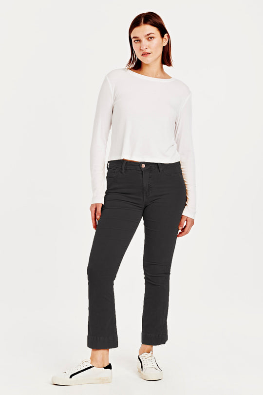 image of a female model wearing a JEANNE SUPER HIGH RISE CROPPED FLARE CORDUROY PANTS BLACK DEAR JOHN DENIM 