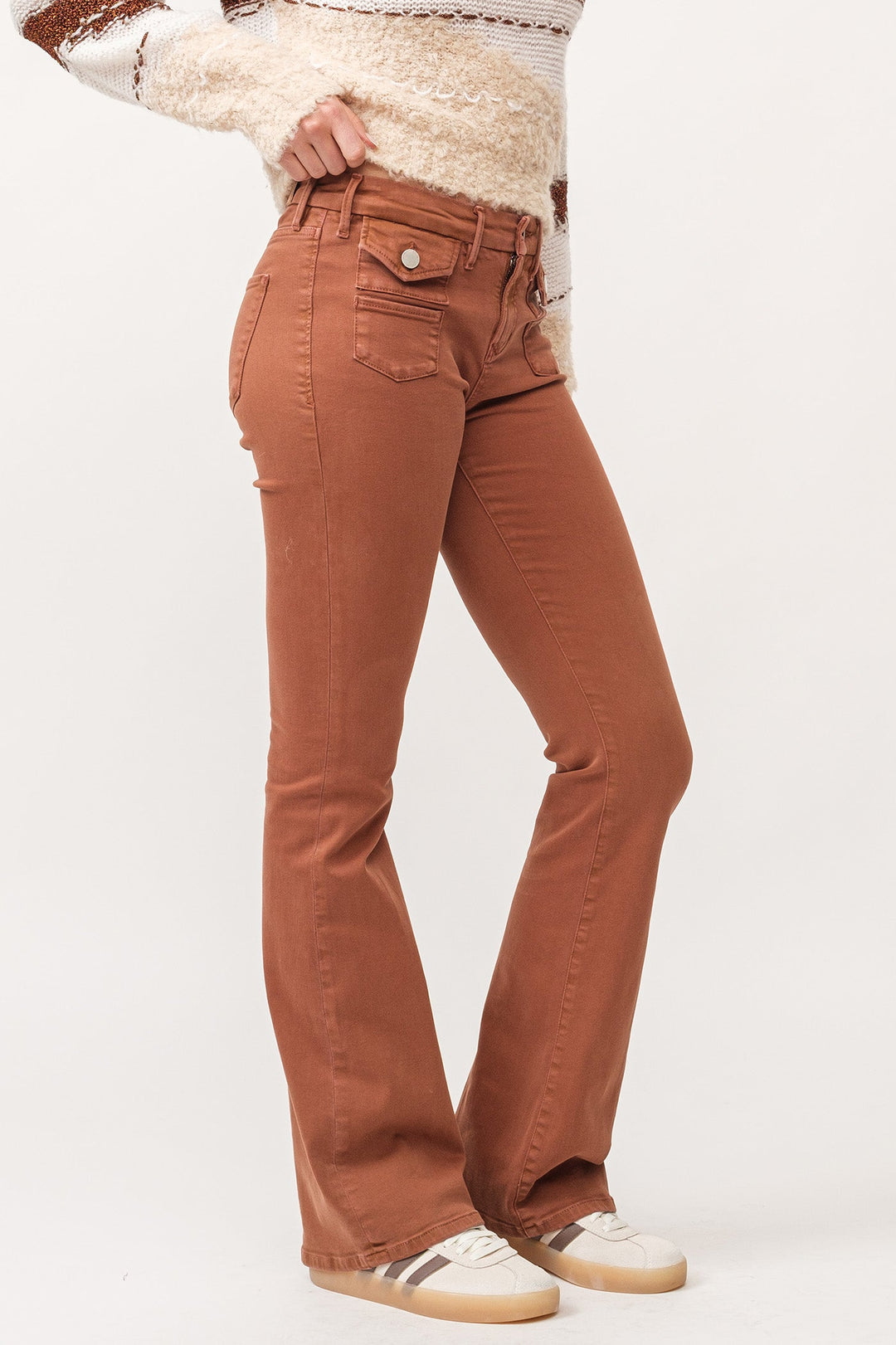 image of a female model wearing a JAXTYN MID RISE CLEAN HEM BOOTCUT JEANS BURNT SIENNA DEAR JOHN DENIM 