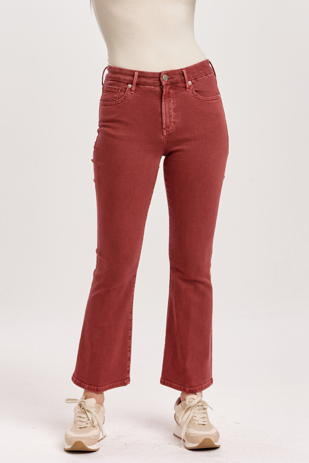 image of a female model wearing a JEANNE HIGH RISE CROPPED FLARE JEANS INTENSE RUST DEAR JOHN DENIM 