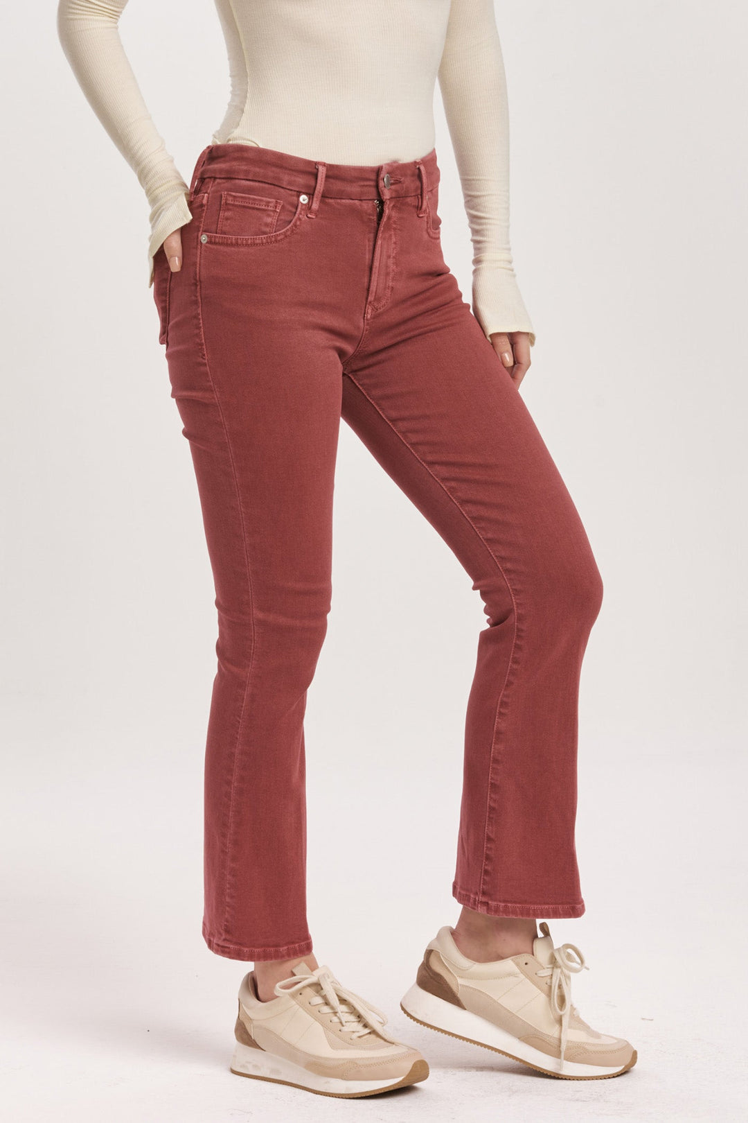 image of a female model wearing a JEANNE HIGH RISE CROPPED FLARE JEANS INTENSE RUST DEAR JOHN DENIM 