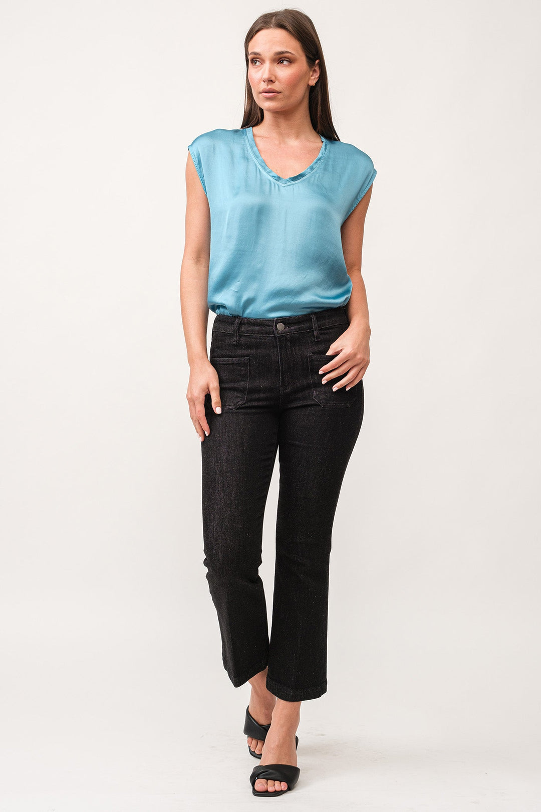 image of a female model wearing a JEANNE MID RISE CLEAN WIDE HEM FLARE PANTS TRUE BLACK DEAR JOHN DENIM 