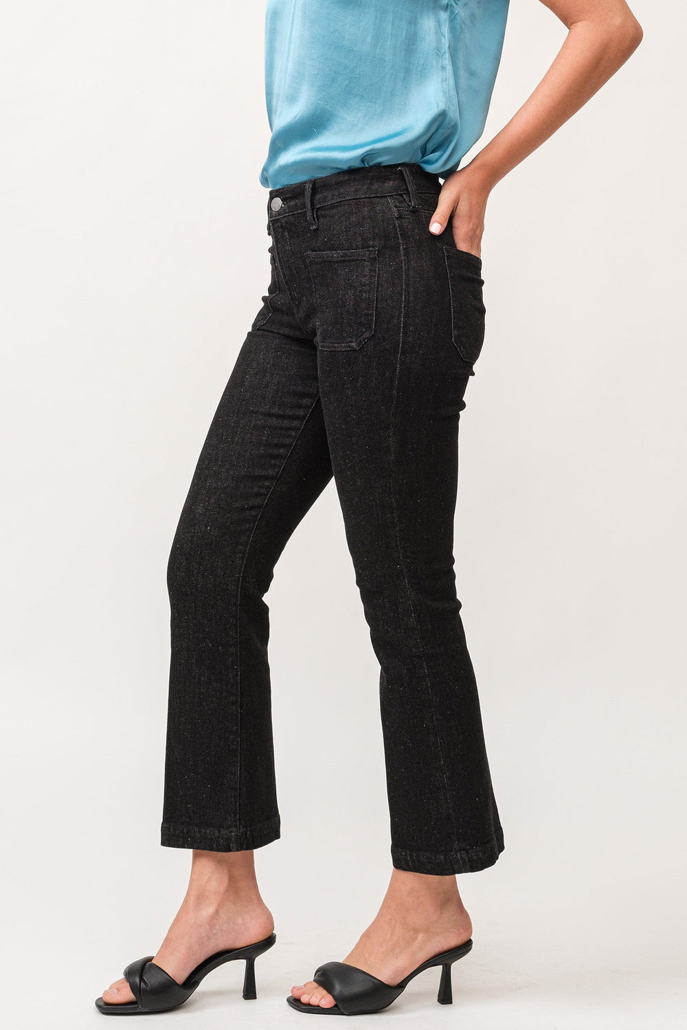 image of a female model wearing a JEANNE MID RISE CLEAN WIDE HEM FLARE PANTS TRUE BLACK DEAR JOHN DENIM 