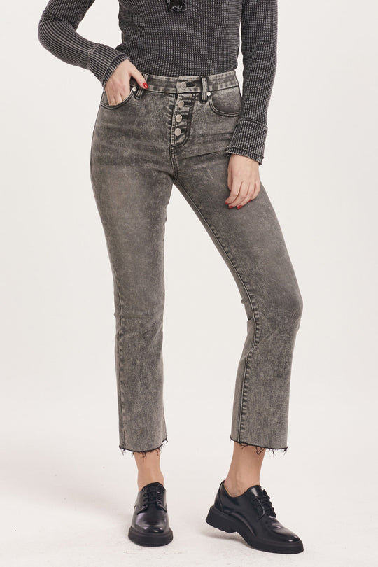 image of a female model wearing a JEANNE HIGH RISE CROPPED FLARE JEANS SHADE DEAR JOHN DENIM 