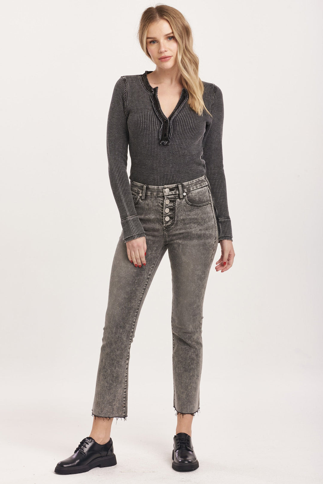 image of a female model wearing a JEANNE HIGH RISE CROPPED FLARE JEANS SHADE DEAR JOHN DENIM 