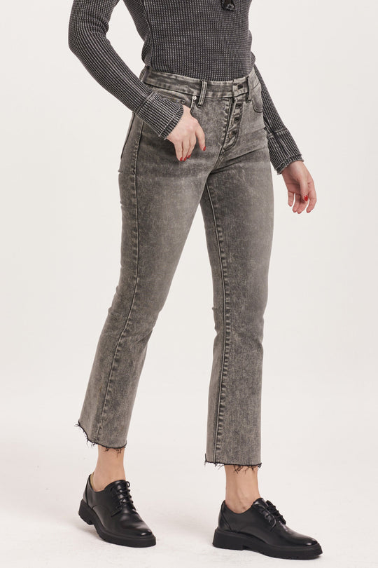 image of a female model wearing a JEANNE HIGH RISE CROPPED FLARE JEANS SHADE DEAR JOHN DENIM 