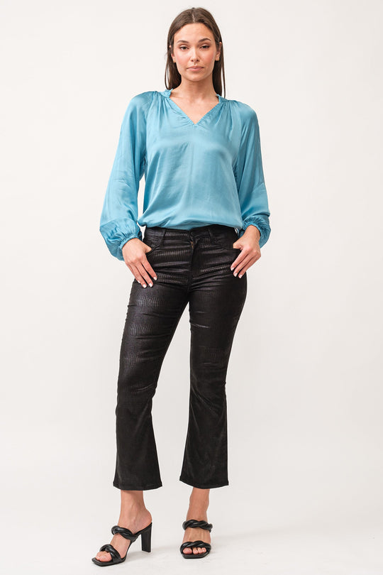 image of a female model wearing a JEANNE MID RISE CLEAN WIDE HEM FLARE PANTS BLACK LICORICE DEAR JOHN DENIM 