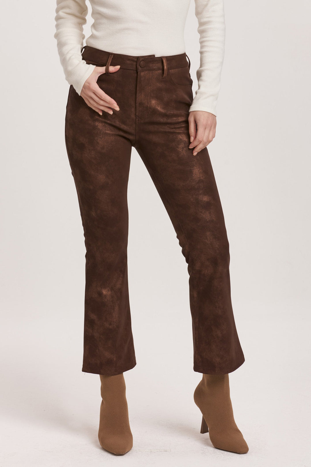 image of a female model wearing a JEANNE SUPER HIGH RISE CROPPED FLARE PANTS BROWN SHIMMER VEGAN LEATHER DEAR JOHN DENIM 