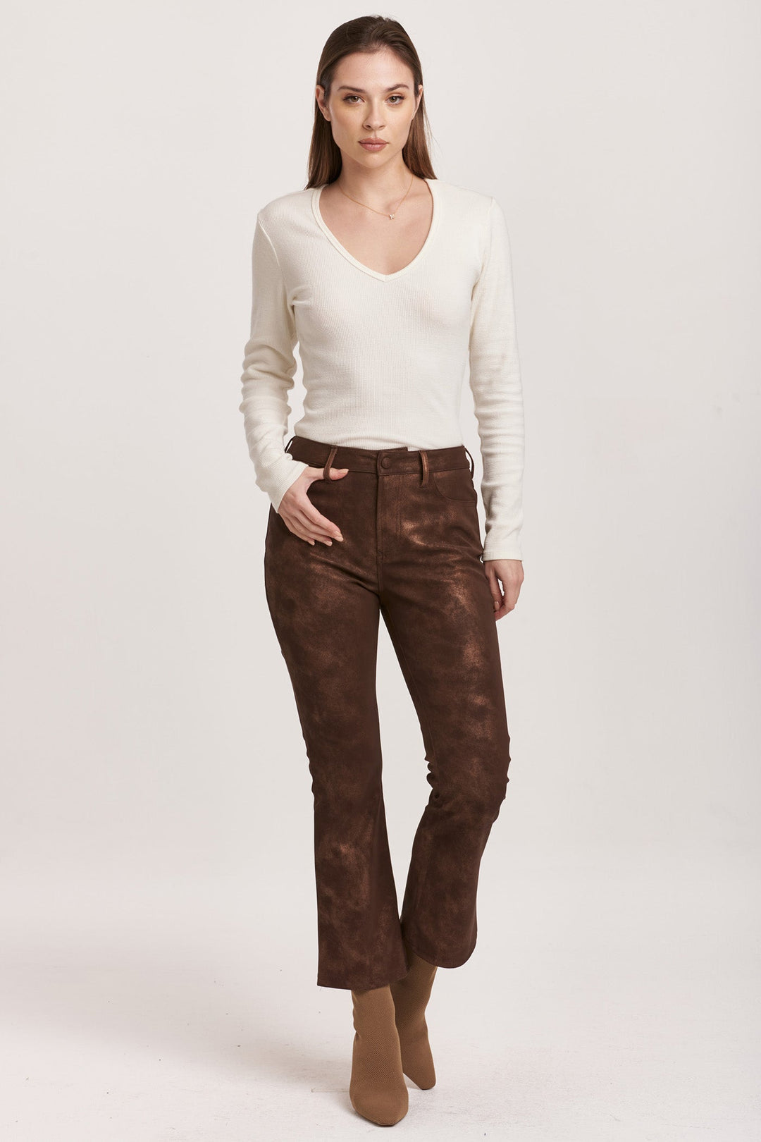 image of a female model wearing a JEANNE SUPER HIGH RISE CROPPED FLARE PANTS BROWN SHIMMER VEGAN LEATHER DEAR JOHN DENIM 