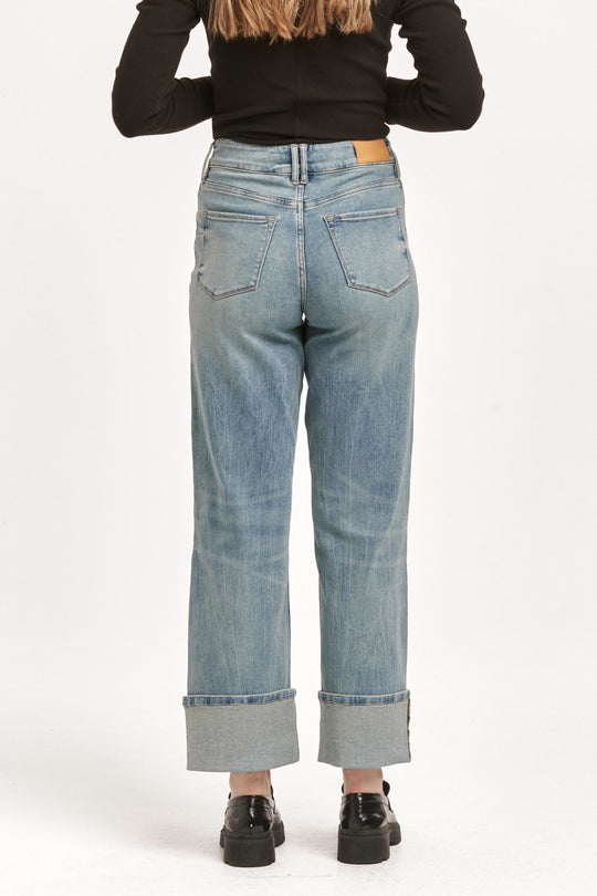 image of a female model wearing a HOLLY SUPER HIGH RISE CUFFED STRAIGHT JEANS PIONEER VALLEY DEAR JOHN DENIM 