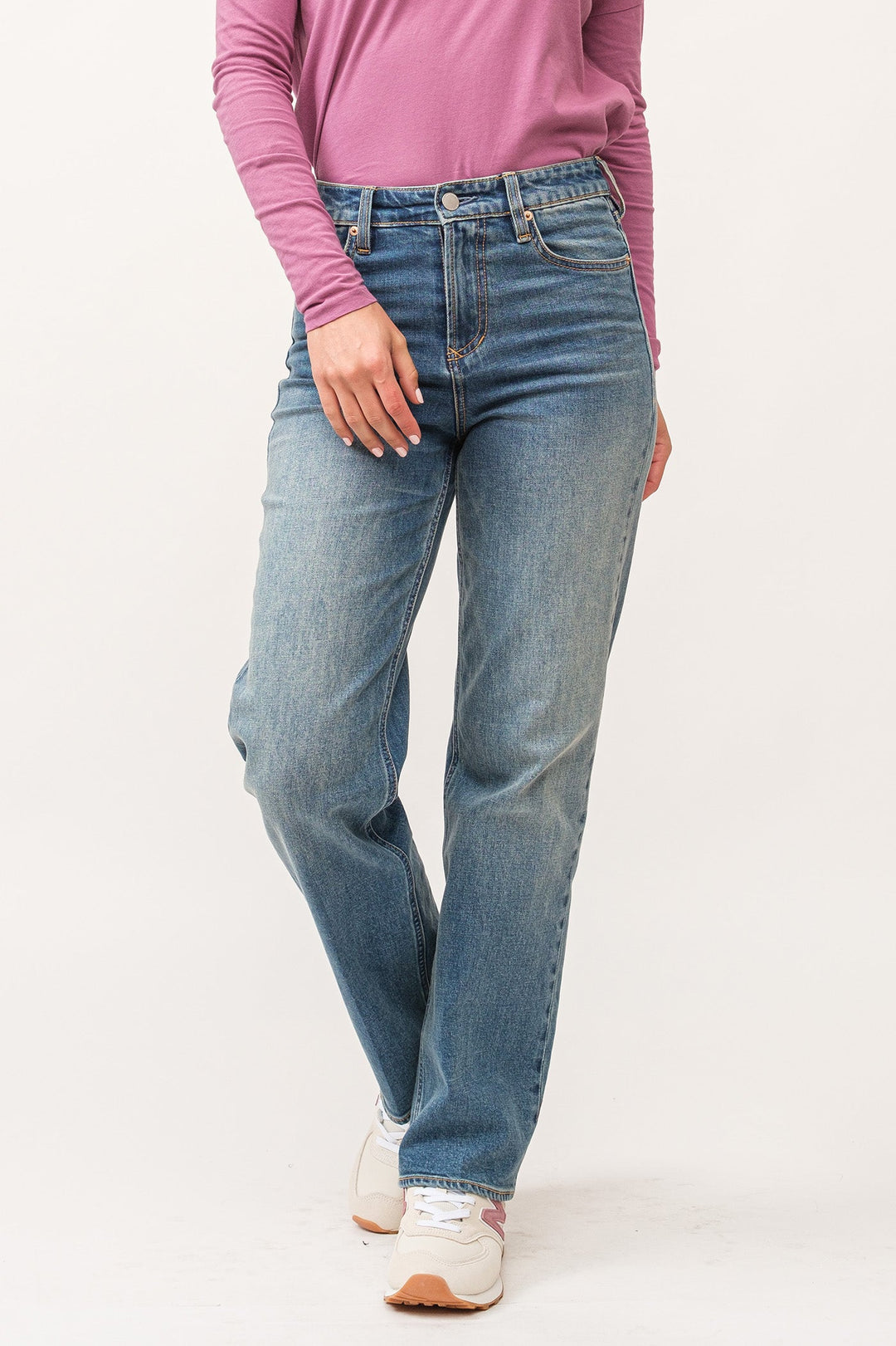 image of a female model wearing a HOLLY HIGH RISE CLEAN HEM STRAIGHT JEANS FALCON DEAR JOHN DENIM 