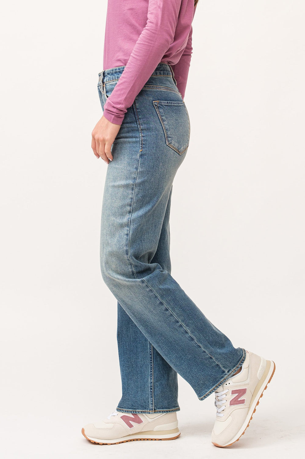 image of a female model wearing a HOLLY HIGH RISE CLEAN HEM STRAIGHT JEANS FALCON DEAR JOHN DENIM 