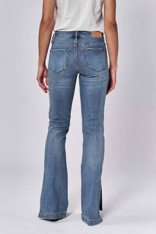 image of a female model wearing a ROSA MID RISE FULL INSEAM FLARE JEANS FONTANA DEAR JOHN DENIM 