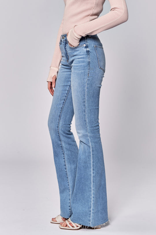 image of a female model wearing a ROSA MID RISE FULL INSEAM FLARE JEANS BELLE DEAR JOHN DENIM 