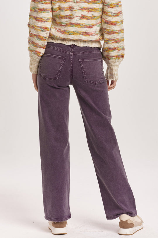 image of a female model wearing a HOLLY SUPER HIGH RISE WIDE HEM STRAIGHT JEANS PURPLE PLUM DEAR JOHN DENIM 