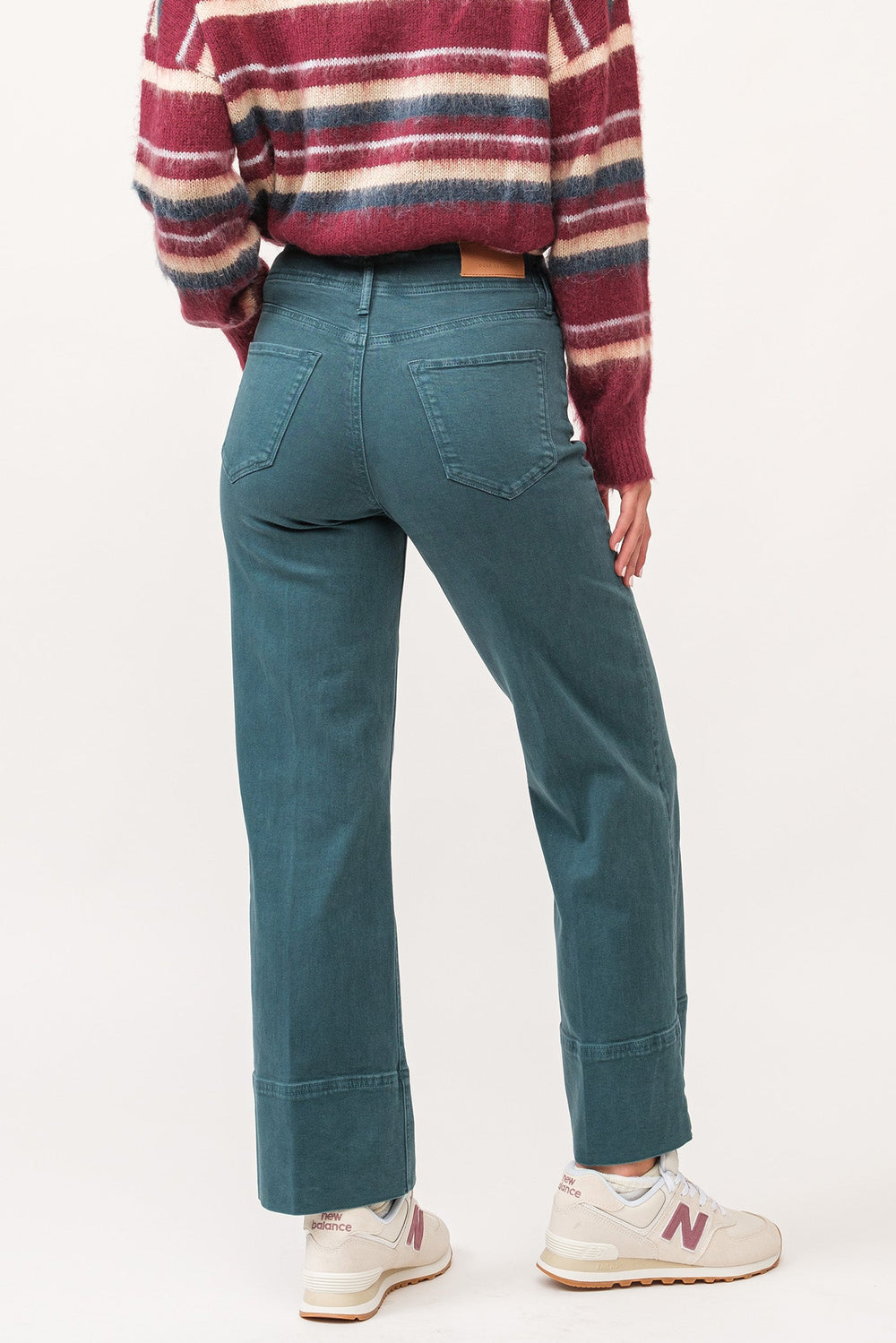 image of a female model wearing a HOLLY HIGH RISE CLEAN HEM STRAIGHT JEANS DEEP TEAL DEAR JOHN DENIM 