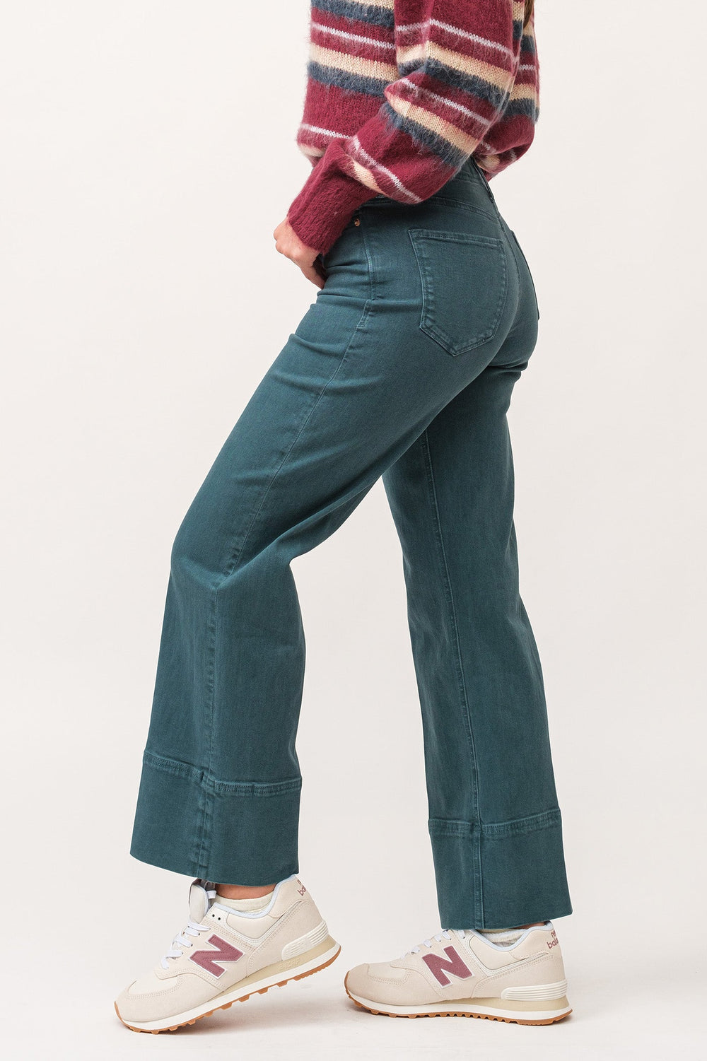 image of a female model wearing a HOLLY HIGH RISE CLEAN HEM STRAIGHT JEANS DEEP TEAL DEAR JOHN DENIM 