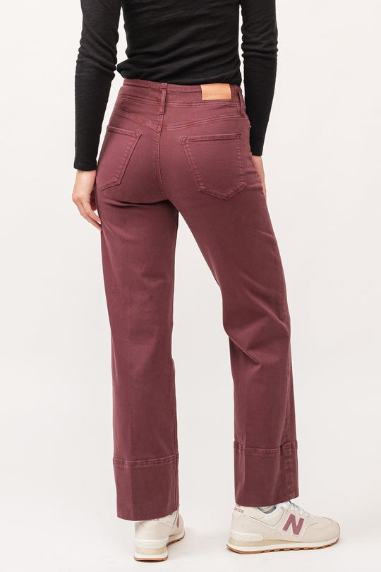 image of a female model wearing a HOLLY HIGH RISE CLEAN HEM STRAIGHT JEANS MAROON DEAR JOHN DENIM 