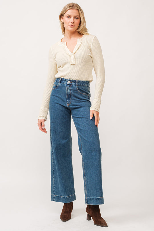 image of a female model wearing a AUDREY HIGH RISE CLEAN HEM WIDE LEG JEANS BLUENOTE DEAR JOHN DENIM 