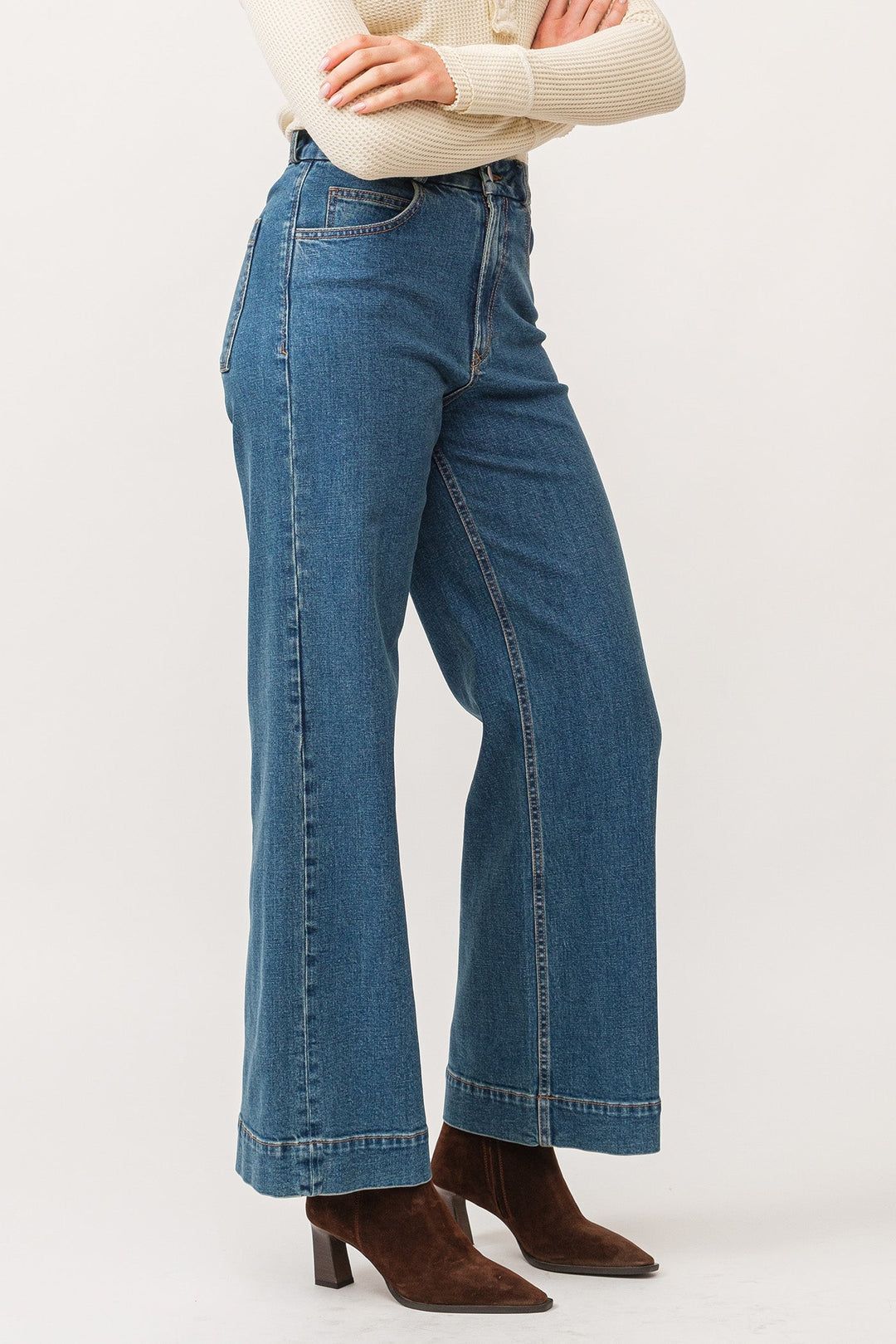 image of a female model wearing a AUDREY HIGH RISE CLEAN HEM WIDE LEG JEANS BLUENOTE DEAR JOHN DENIM 