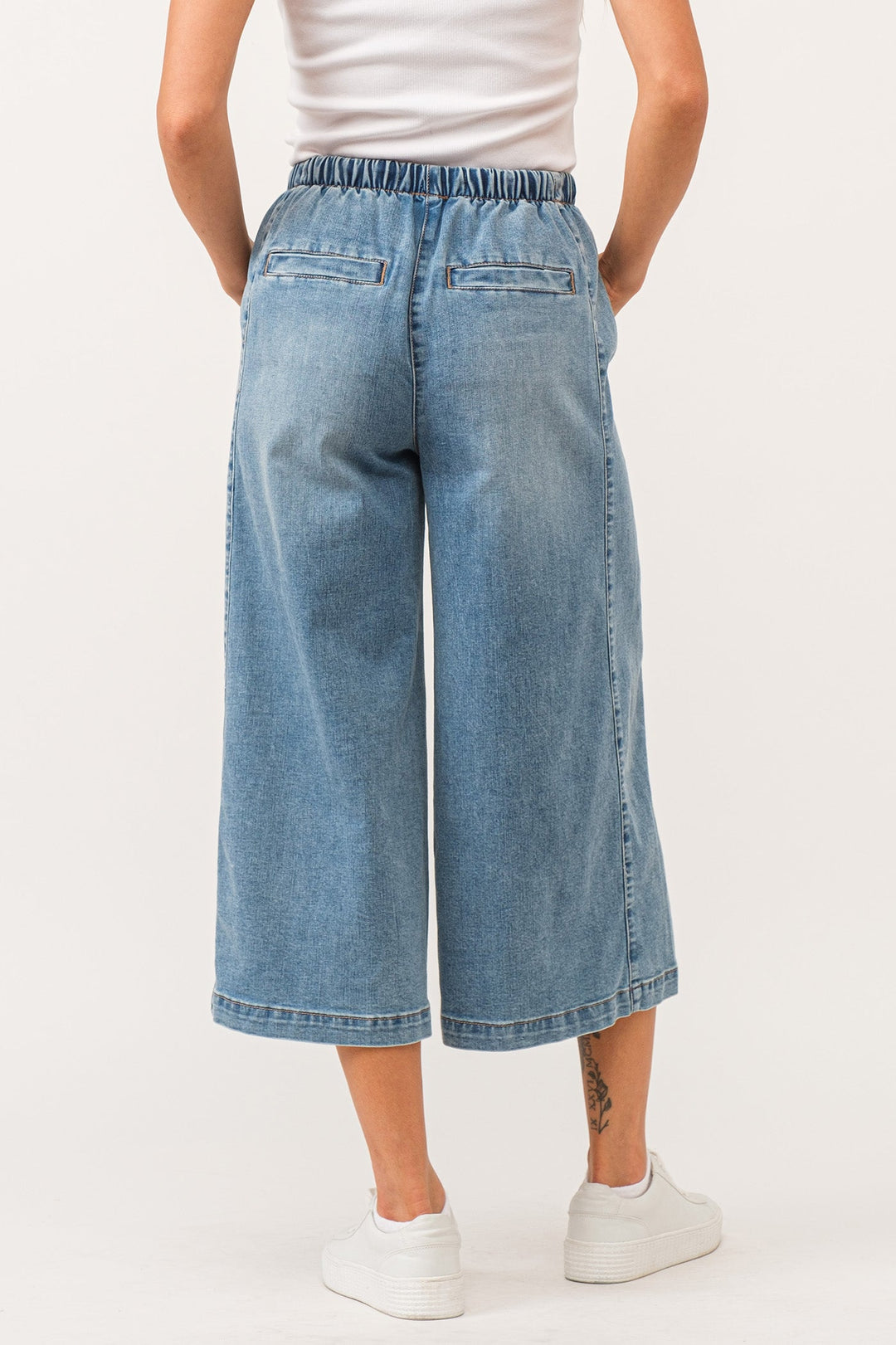 image of a female model wearing a ELINA SUPER HIGH RISE CROPPED WIDE LEG PANTS WINETOP CHAMBRAY DEAR JOHN DENIM 