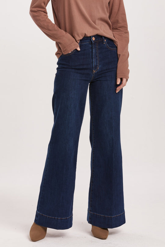 image of a female model wearing a FIONA HIGH RISE WIDE LEG JEANS STAR DEMAND DEAR JOHN DENIM 