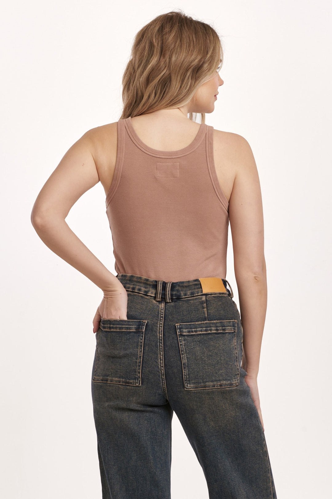 image of a female model wearing a TAMIA RACER TANK TIMELESS TAUPE DEAR JOHN DENIM 