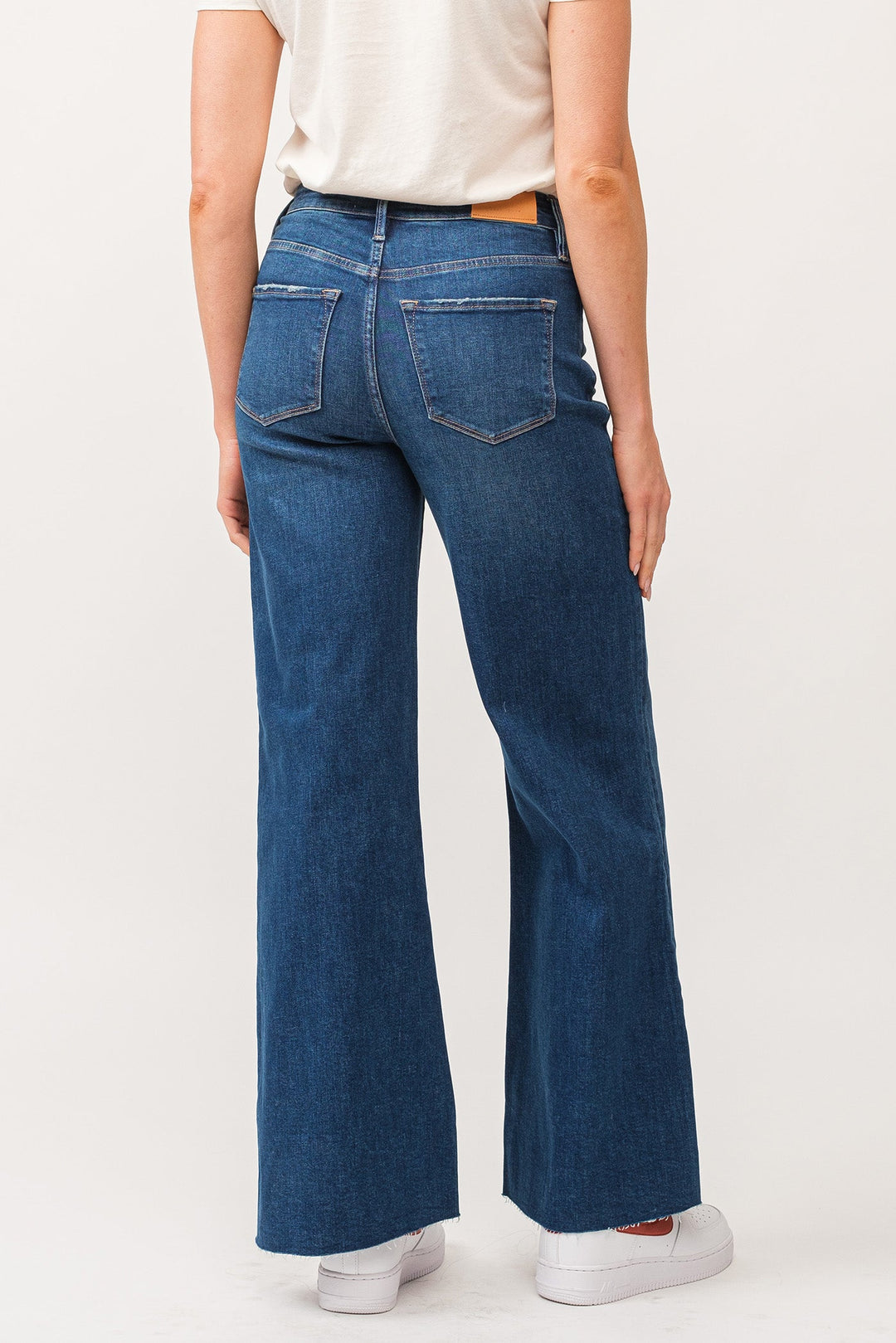 image of a female model wearing a FIONA HIGH RISE RAW CUT HEM WIDE LEG JEANS BOREALIS DEAR JOHN DENIM 