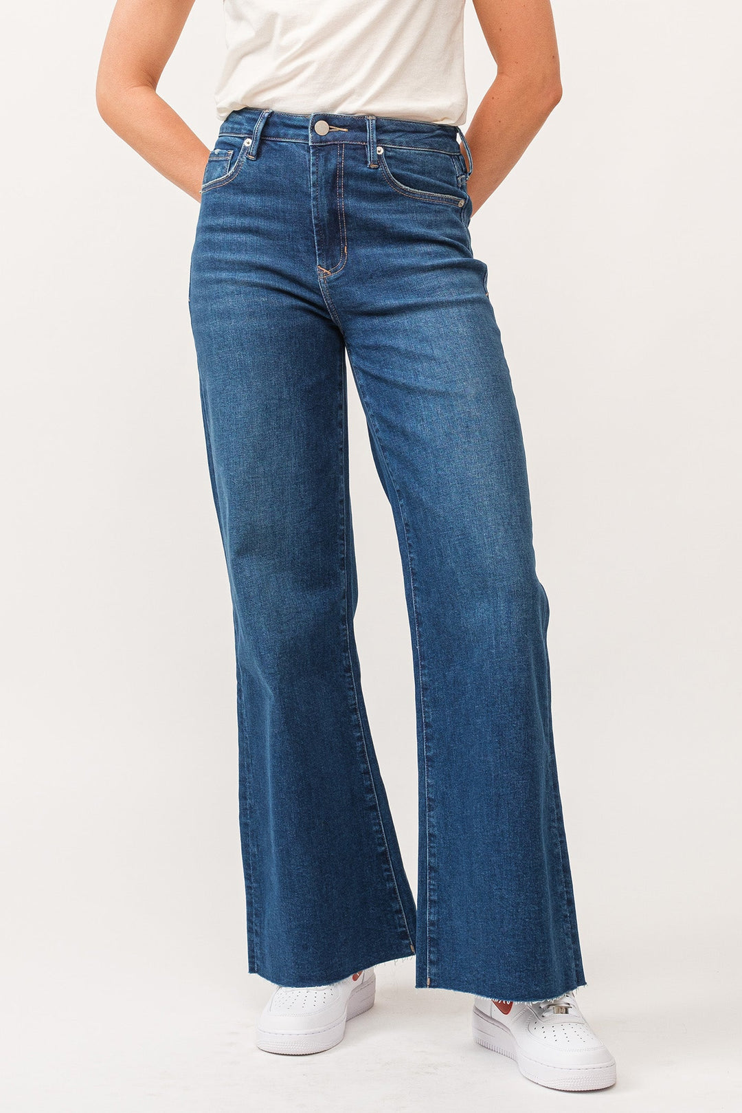 image of a female model wearing a FIONA HIGH RISE RAW CUT HEM WIDE LEG JEANS BOREALIS DEAR JOHN DENIM 