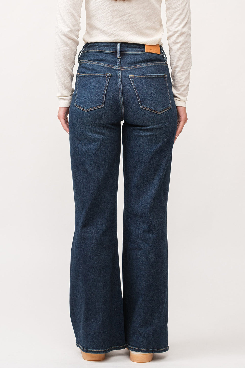 image of a female model wearing a FIONA HIGH RISE CLEAN HEM WIDE LEG JEANS IGUAZA DEAR JOHN DENIM 