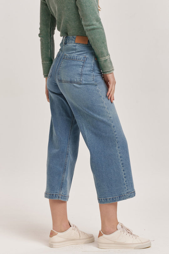 image of a female model wearing a AUDREY SUPER HIGH RISE CROPPED WIDE LEG JEANS HALEYVILLE DEAR JOHN DENIM 