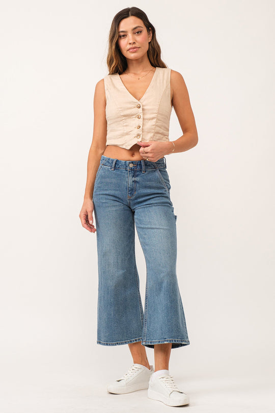 image of a female model wearing a AUDREY SUPER HIGH RISE CROPPED WIDE LEG JEANS CHARISMA DEAR JOHN DENIM 