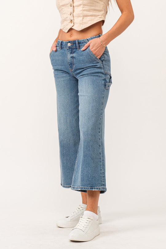 image of a female model wearing a AUDREY SUPER HIGH RISE CROPPED WIDE LEG JEANS CHARISMA DEAR JOHN DENIM 