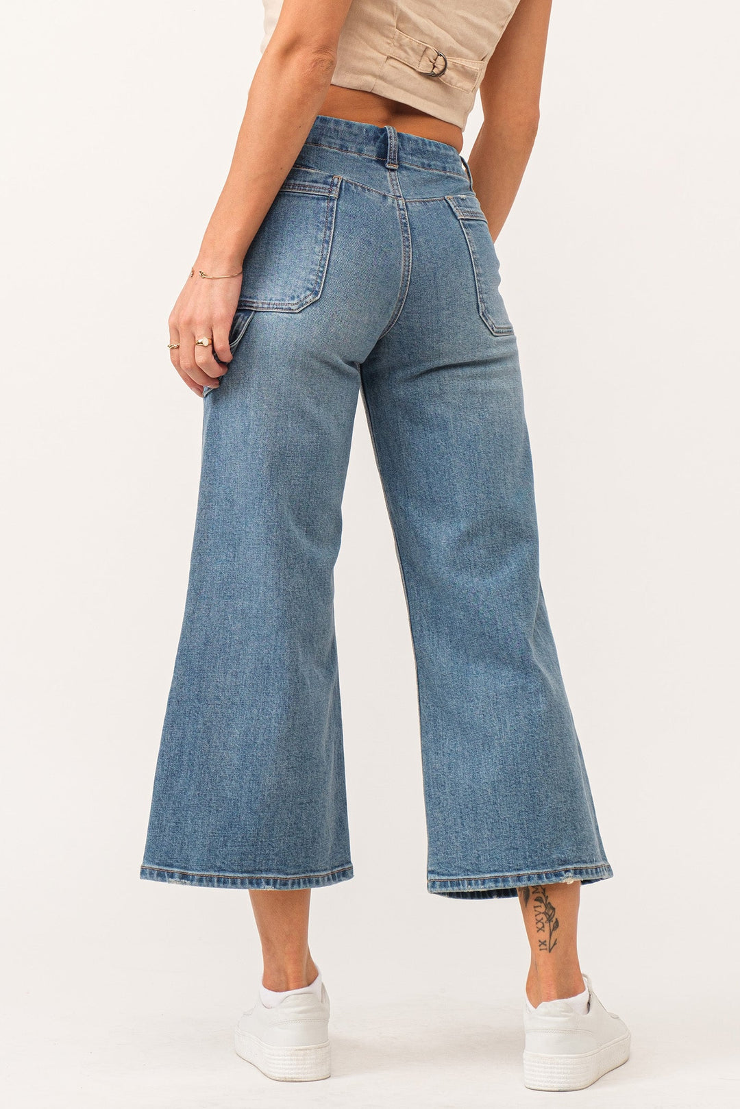 image of a female model wearing a AUDREY SUPER HIGH RISE CROPPED WIDE LEG JEANS CHARISMA DEAR JOHN DENIM 