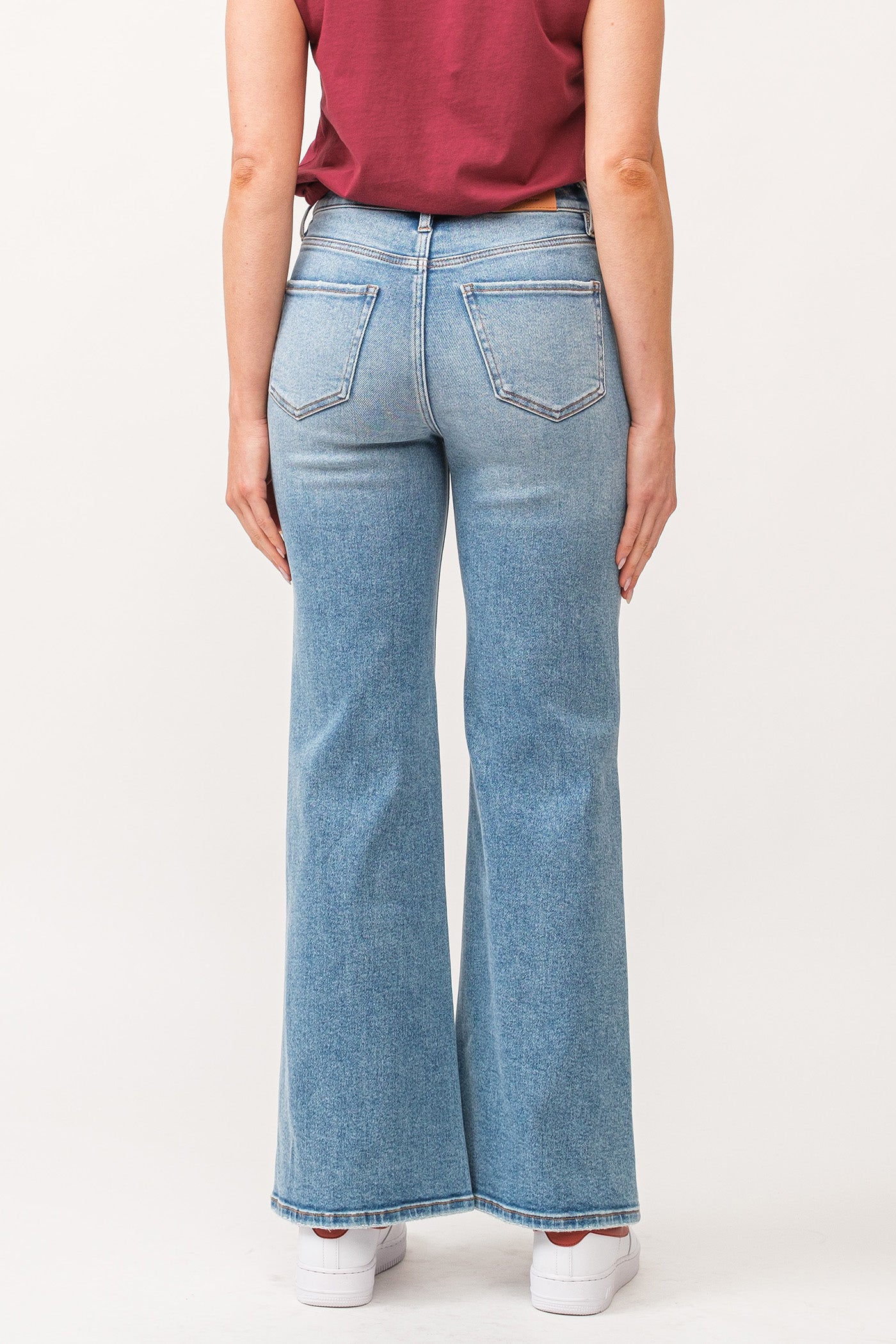 image of a female model wearing a FIONA HIGH RISE CLEAN HEM WIDE LEG JEANS ARDMORE DEAR JOHN DENIM 