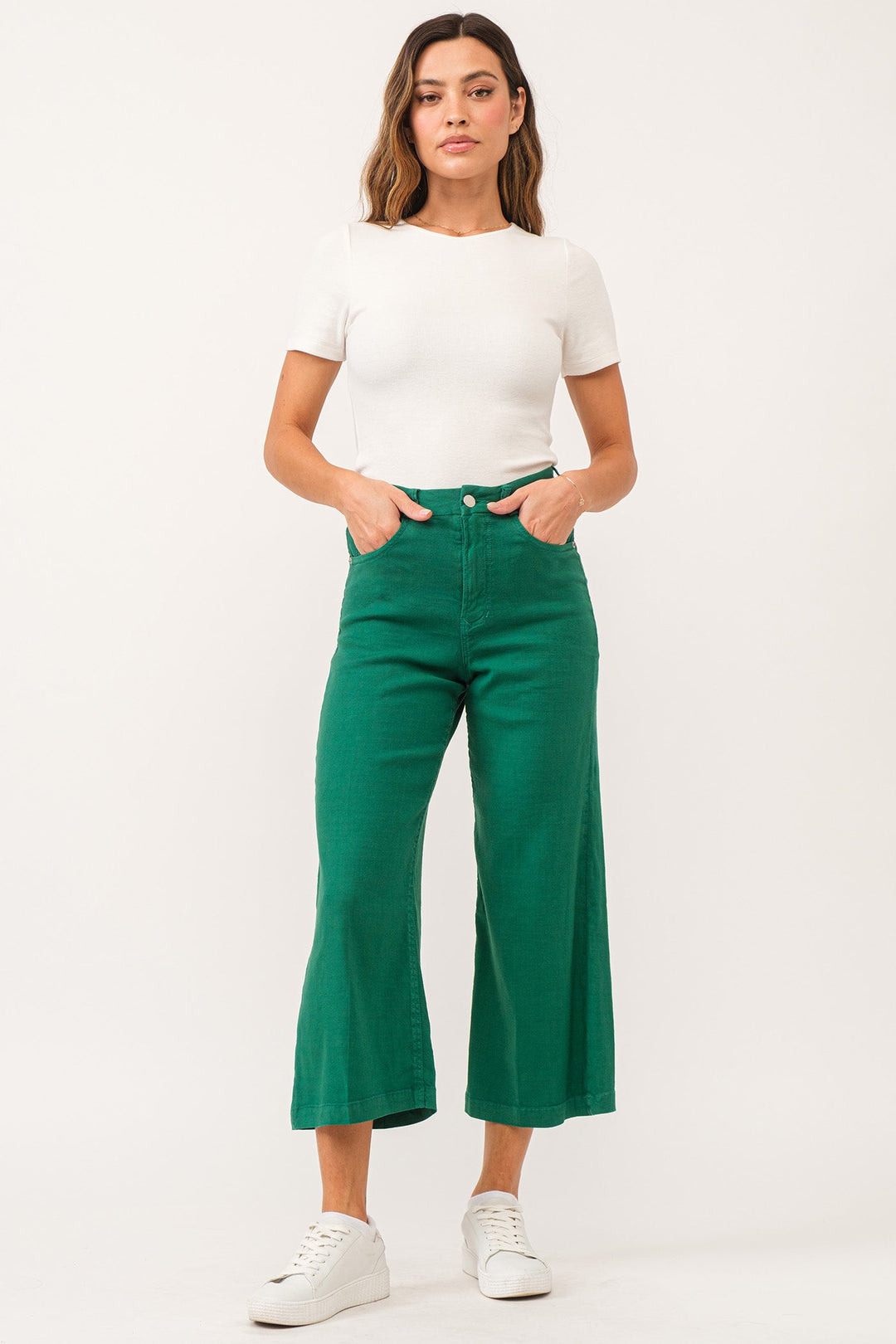 image of a female model wearing a AUDREY SUPER HIGH RISE CROPPED WIDE LEG COLOR PANTS GALAPAGOS GREEN LINEN DEAR JOHN DENIM 