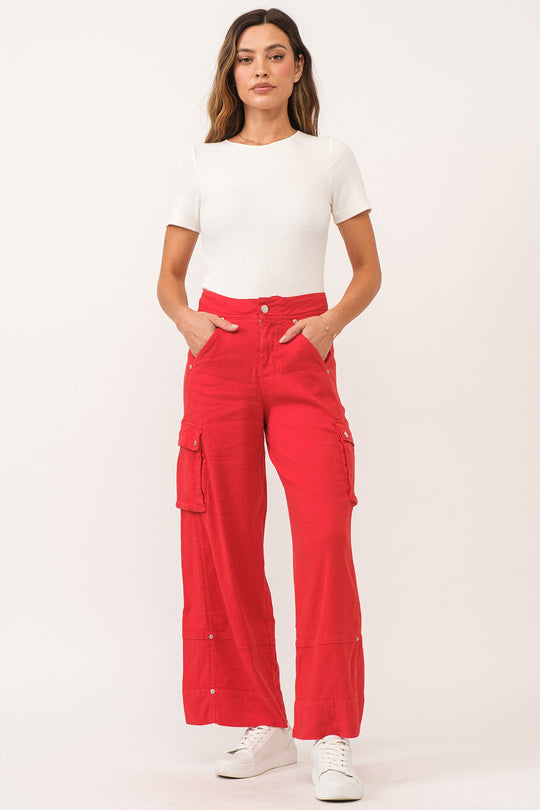 image of a female model wearing a MARVEY SUPER HIGH RISE ANKLE WIDE LEG COLOR PANTS FIRETRUCK RED LINEN DEAR JOHN DENIM 